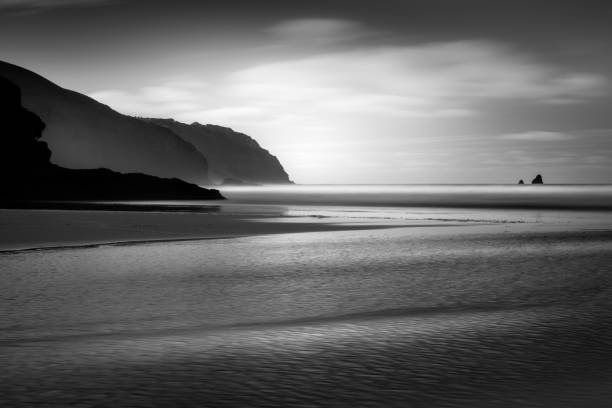 istock Monochrome Layers in the lanscape, Perran Sands, Cornwall 1042948240