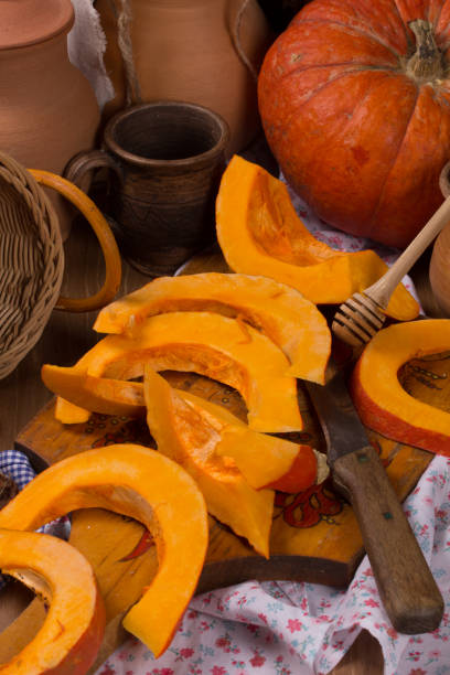 istock Pumpkin cooking on the kitchen table. Vintage style 1042957414