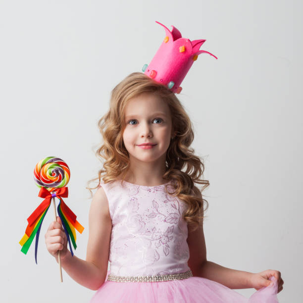 istock Candy princess girl with lollipop 1042958042