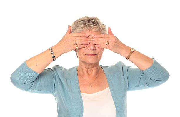 istock Senior older woman covering eyes 104297404