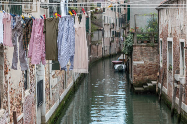 istock Laundry Hanging to Dry over Canal 1042976634