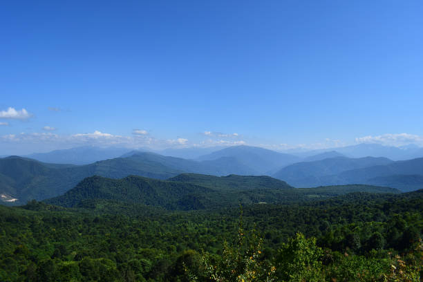istock Green mountains and blue sky. 1042979674