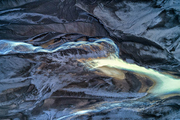 Abstract patterns of glacial flows and river, aerial view, South Coast Iceland