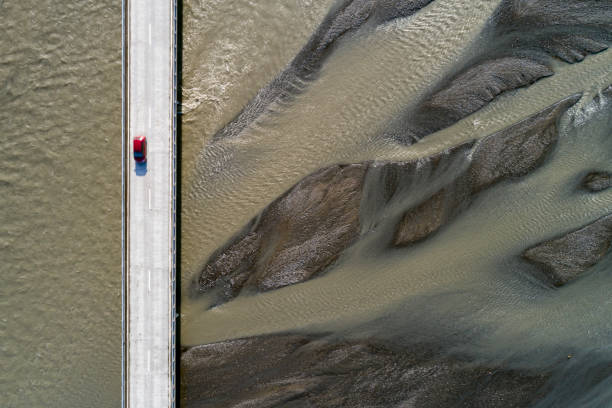 istock Bridge and sand patterns, Iceland, aerial view 1042994632