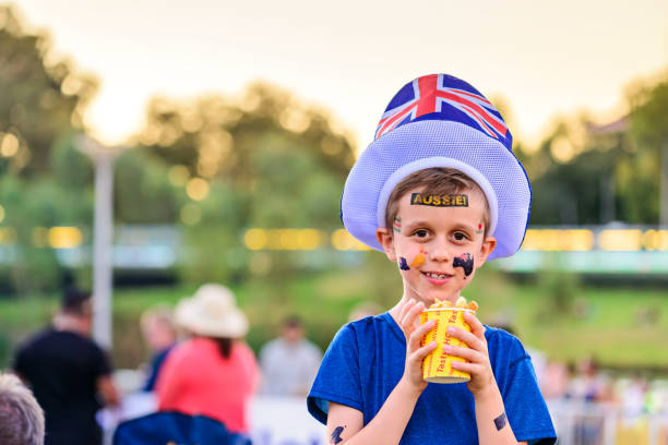 istock Cute Australian boy with flag tattoo on his face 1043011158