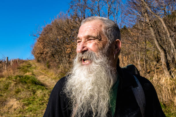 Portrait of senior man with Long Beard, Primorska, Julian Alps, Slovenia, Europe Portrait of senior man with Long Beard, Primorska, Julian Alps, Slovenia, Europe,Nikon D850 primorska white sport nature stock pictures, royalty-free photos & images