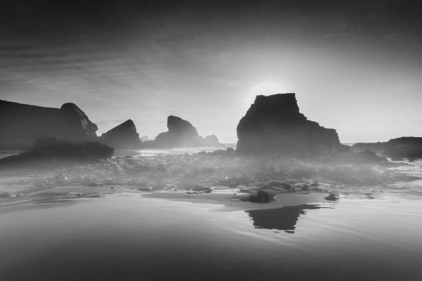 istock Mystical Coastline with reflections and mist, Porthcotham beach, Cornwall 1043016492