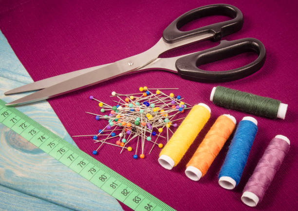 istock Supplies and accessories for sewing - scissors, threads, pins, buttons, centimeter. 1043016642