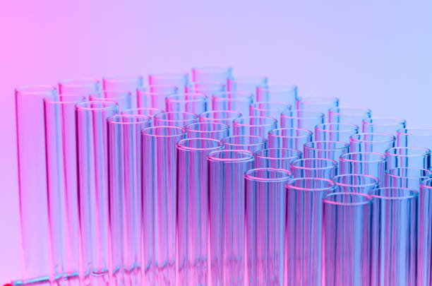 istock Close-Up Of Test Tubes Against Colored Background 1043021646