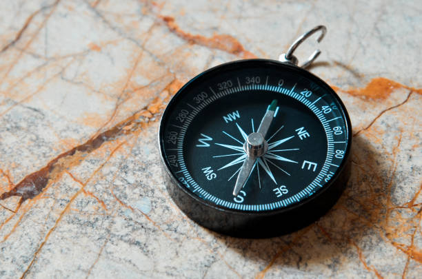 istock High Angle View Of Navigational Compass On Table 1043021650