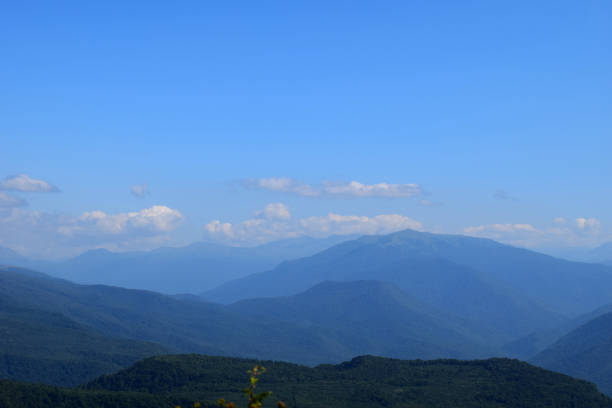 istock Green mountains and blue sky. 1043021916