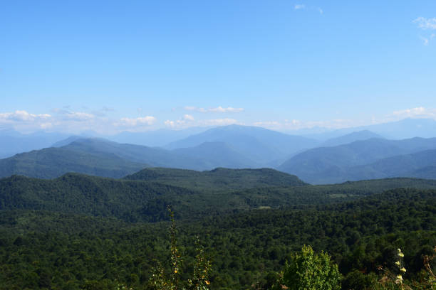 istock Green mountains and blue sky. 1043021938