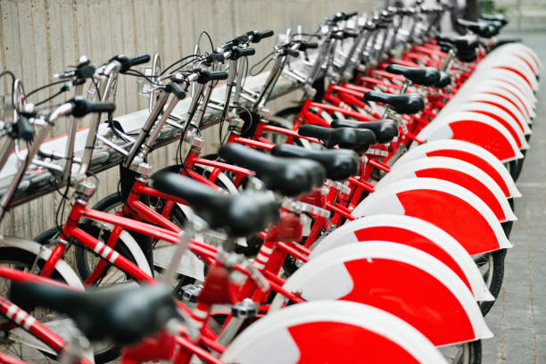 istock Red Bicycles In Row At Parking Lot 1043022524