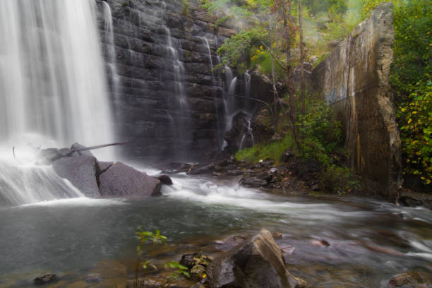 istock Water Flowing Over Dam At Deteriorating Reservoir 1043026910