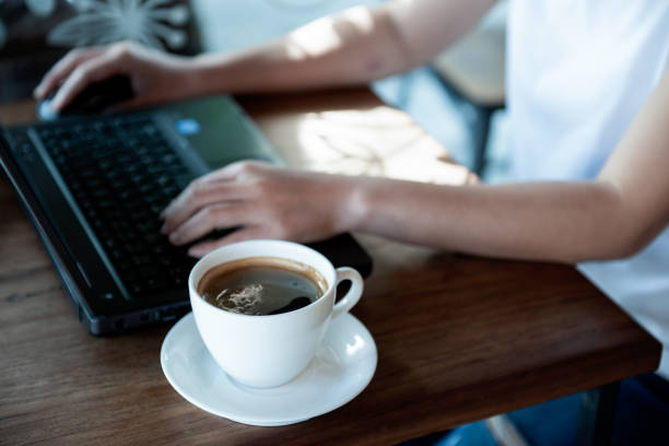 istock Office girl hand on laptop keyboard and mouse. 1043032416