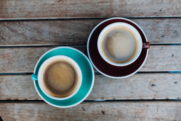 istock Coffee cup on the wooden desk 1043032680