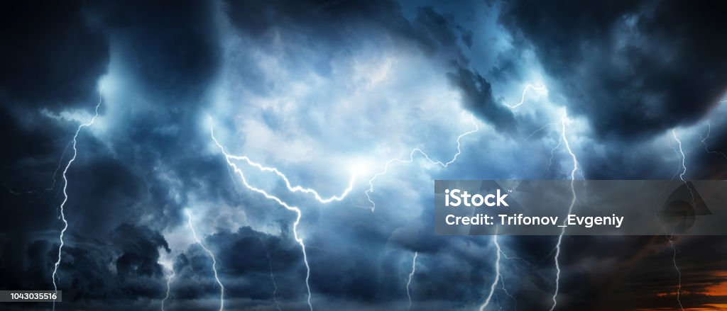 Lightning thunderstorm flash over the night sky. Lightning thunderstorm flash over the night sky. Concept on topic weather, cataclysms (hurricane, Typhoon, tornado, storm) Lightning Stock Photo