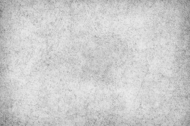istock The texture is black and white in grunge style. Abstract monochrome background. Pattern of chips, cracks, scuffs, dust, stains 1043054422