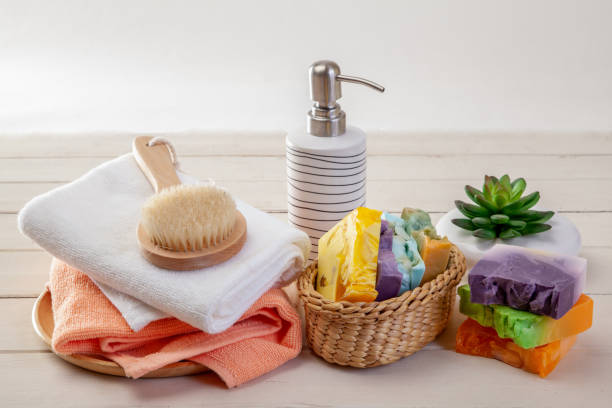 istock Handmade Soap with bath accessories  on wood background 1043056126