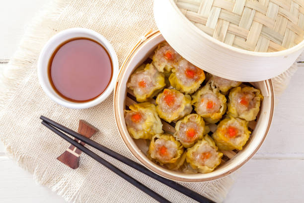 istock Chinese Streamed Dumpling in Bamboo Basket 1043056158
