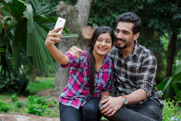 istock Young athletic couple making selfie. - Stock image 1043058980
