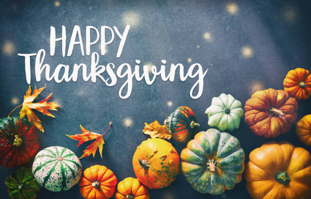 istock Thanksgiving background with various pumpkins, gourds and falling leaves 1043059278