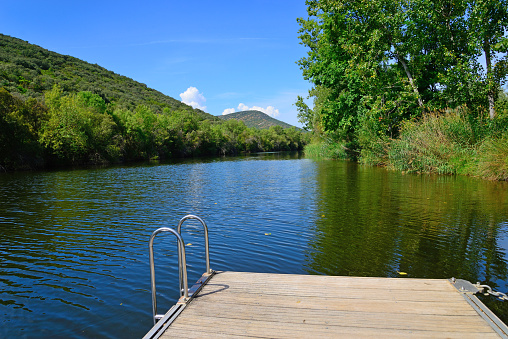 Plataforma flotante en el río Bullaque del entorno natural de las tablas de la Yedra, Piedrabuena, Ciudad Real, España. photo
