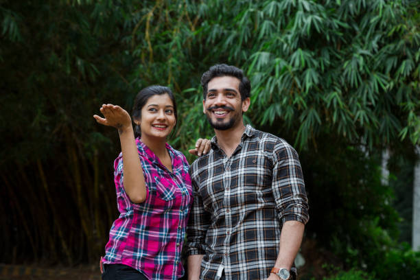 istock Couple posing with perfect smile and white teeth - Stock image 1043059356