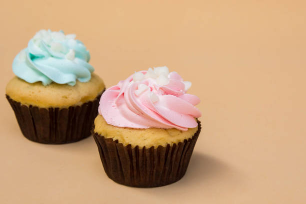 istock sweet cup cake dessert on yellow background and copy space 1043062620