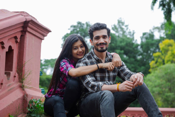 Beautiful, young couple - Stock image Caucasian Ethnicity, Couple - Relationship, Kissing, Laughing, Smiling, Indian indian couple kiss stock pictures, royalty-free photos & images