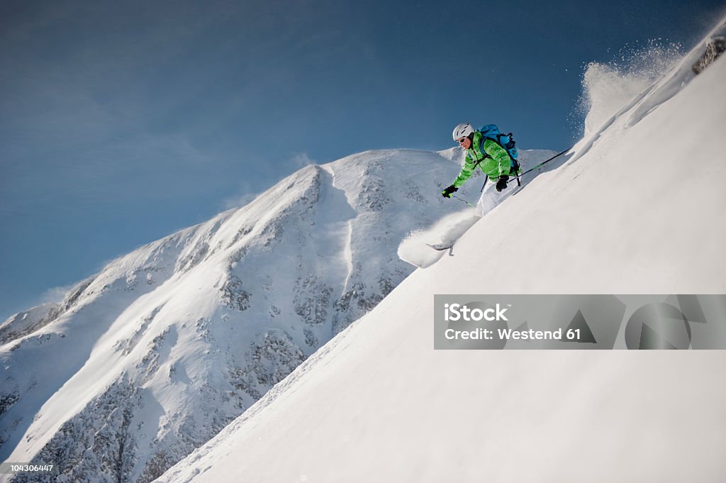 Austria, Salzburg, Altenmarkt-Zauchensee, Austrian woman skiing  Skiing Stock Photo
