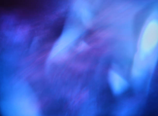 istock Blurred blue background lights. New Year Christmas background. Abstract defocused gold, white, red and yellow glitters texture. Shining glowing effects 1043065266