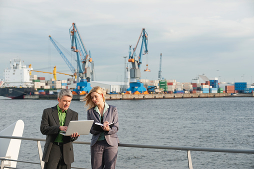 Germany, Hamburg, Business people working at harbour