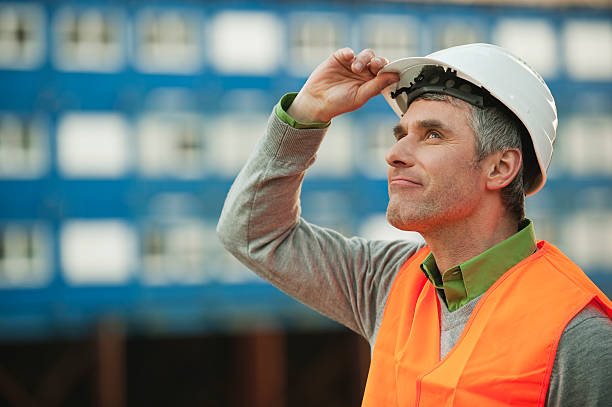 istock Germany, Hamburg, Man looking away at harbour 104306617