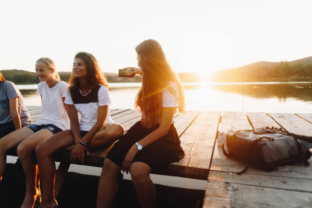 istock Photographing sunset while sitting on the dock 1043070348