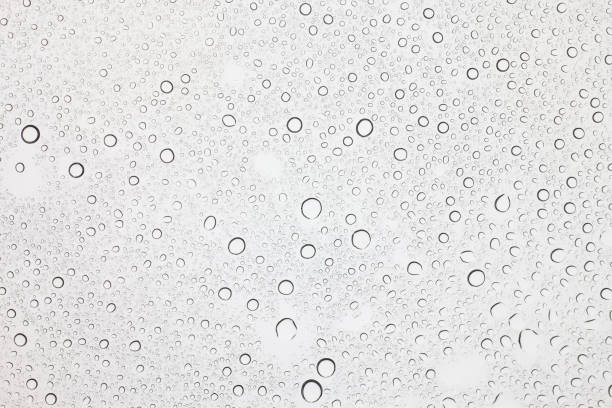 istock Rain droplets on glass background, Water drops on glass. 1043070888