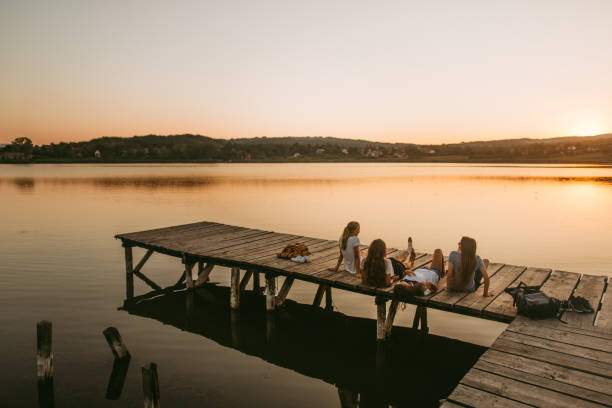 istock Enjoying the sunset from the dock 1043071046