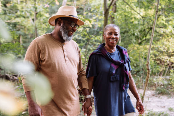istock Smiling seniors couple on the walk 1043074136