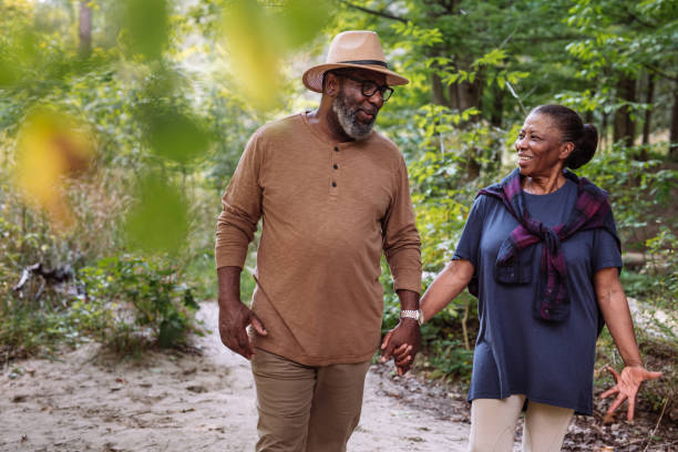 istock Smiling seniors couple on the walk 1043074204