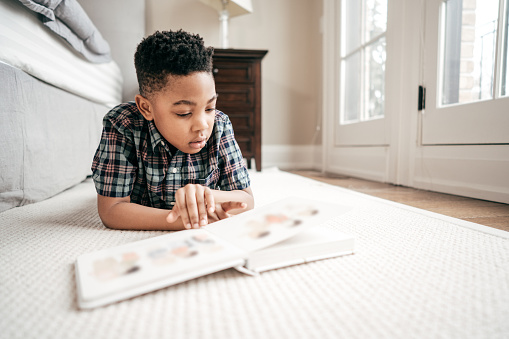 boy reading a book