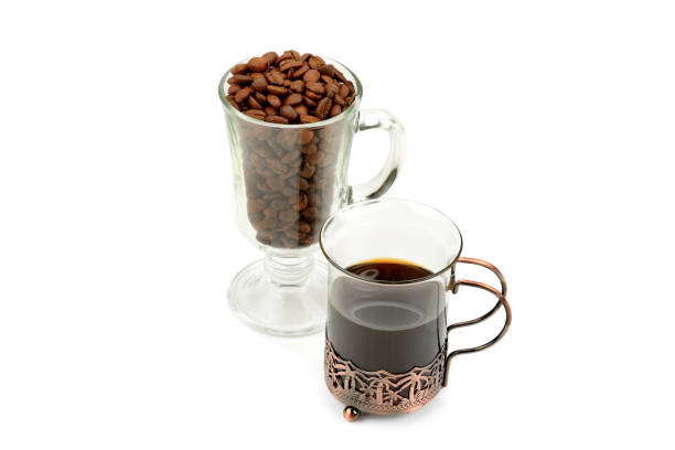 istock coffee in a delicate glass and coffee beans isolated on white background 1043078634