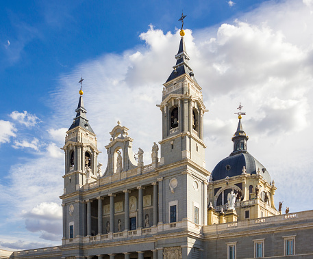 Beautiful view of Cathedral of La Almudena in Madrid on bright blue sky