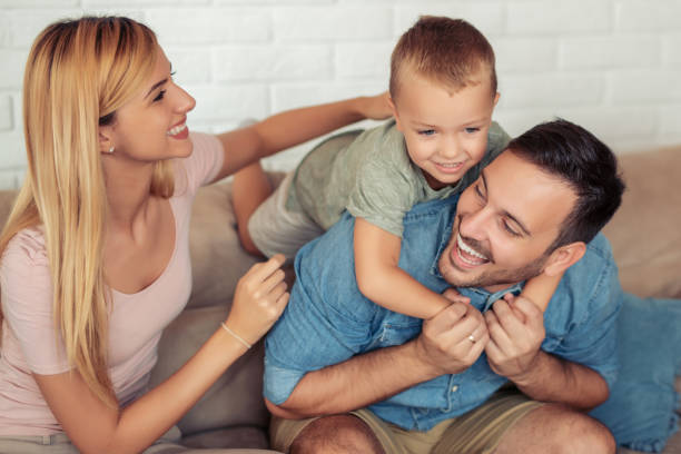 istock Happy family enjoying at home 1043085264