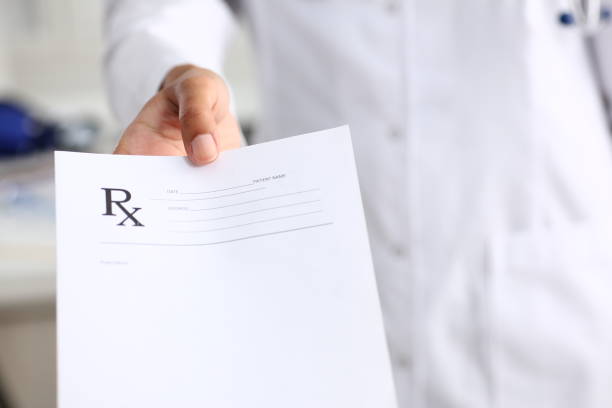istock Female black doctor hands hold and give 1043090584