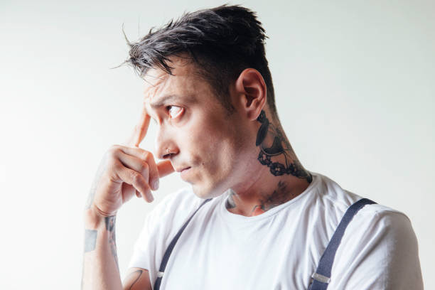Young adult man thinking