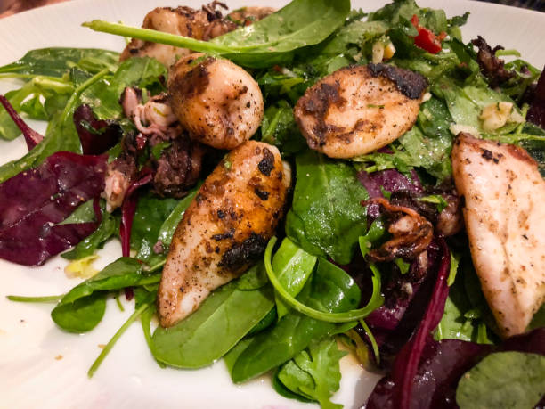 istock grilled squid and fresh salad 1043099684