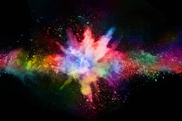 abstract colored dust explosion on a black background.abstract powder splatted background,Freeze motion of color powder exploding/throwing color powder, multicolored glitter texture.