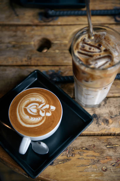 istock Coffee latte on wooden table 1043118908