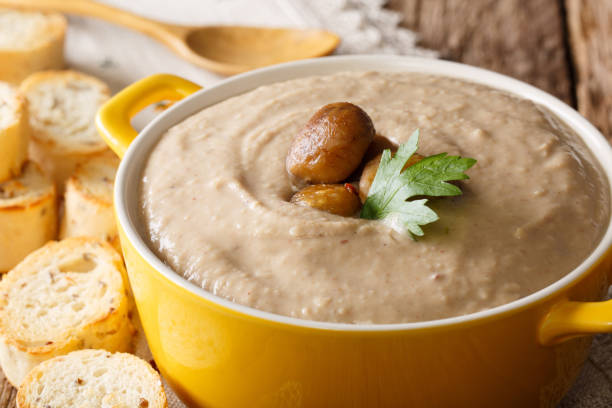 istock Puree chestnut soup with toasted bread macro. horizontal 1043127748