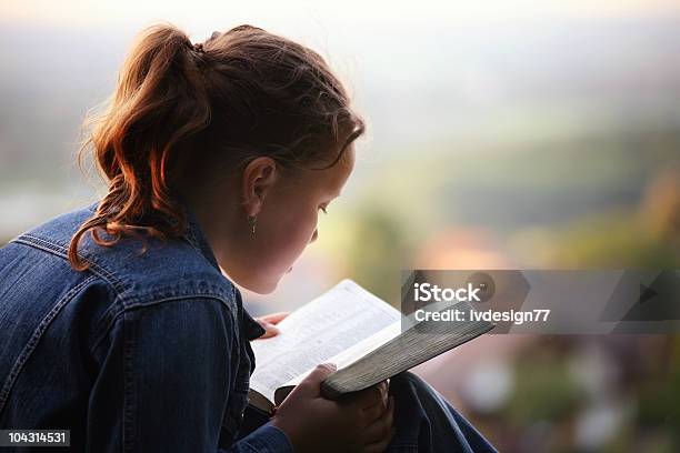 Reading The Bible Stock Photo - Download Image Now - Bible, Reading, Child